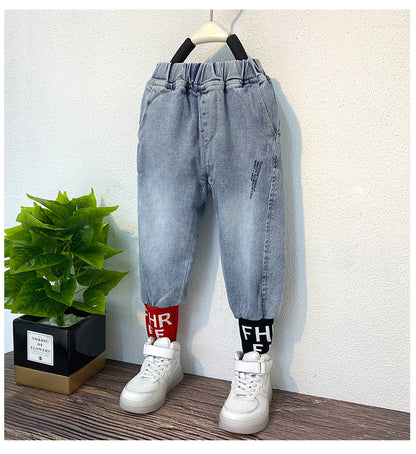 Jeans für Jungen und Mädchen im Frühlingsstil hübsche Kinder